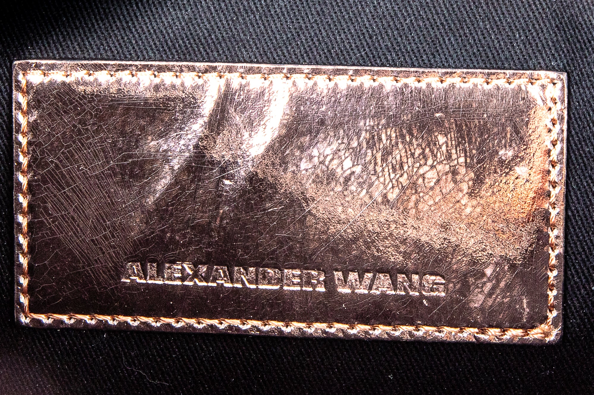 Metallic Adriel Rose Gold Clutch