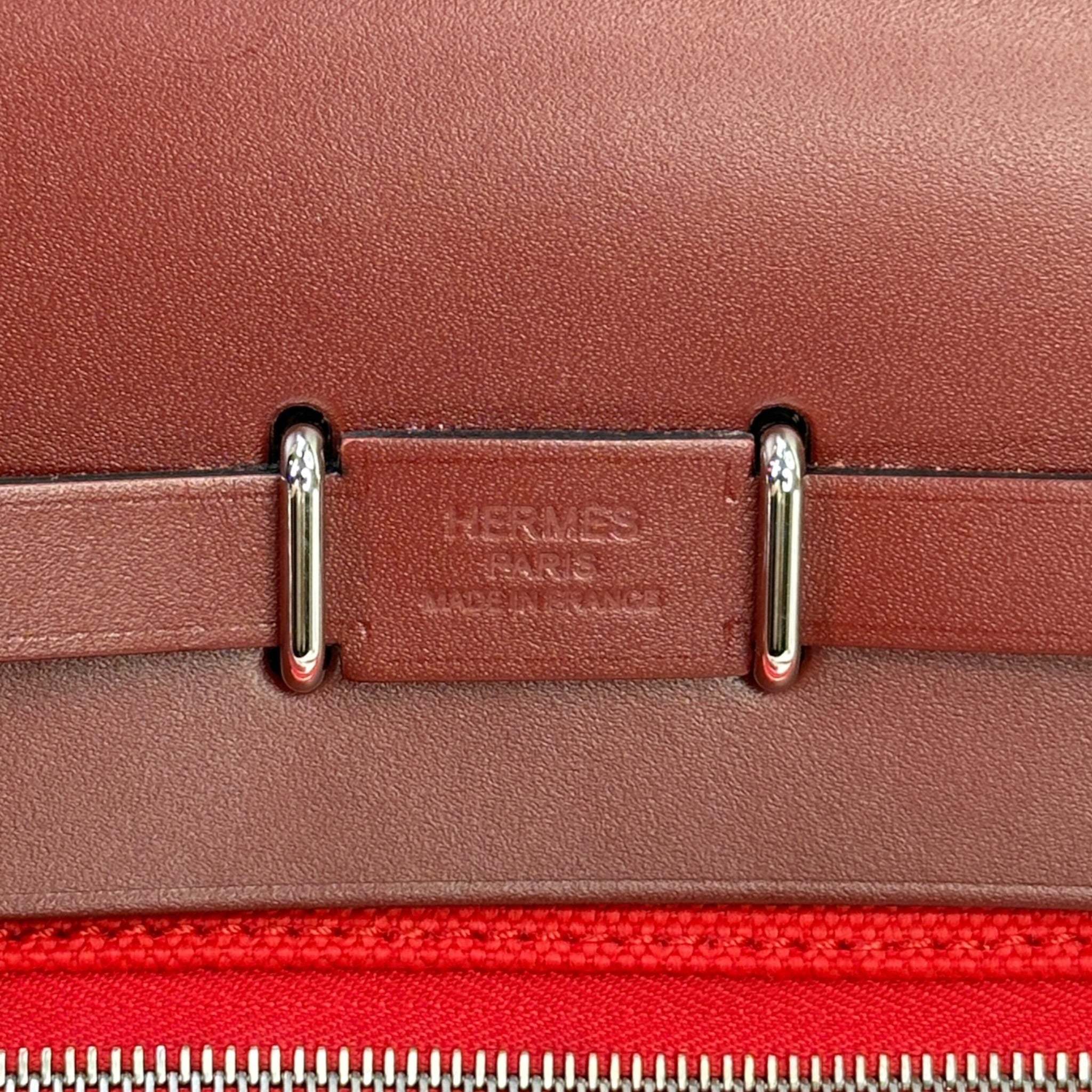 Hermès Retourne 20 Rouge Herbag Military Canvas and Vache Hunter Leather with a Palladium-Plated (2025)
