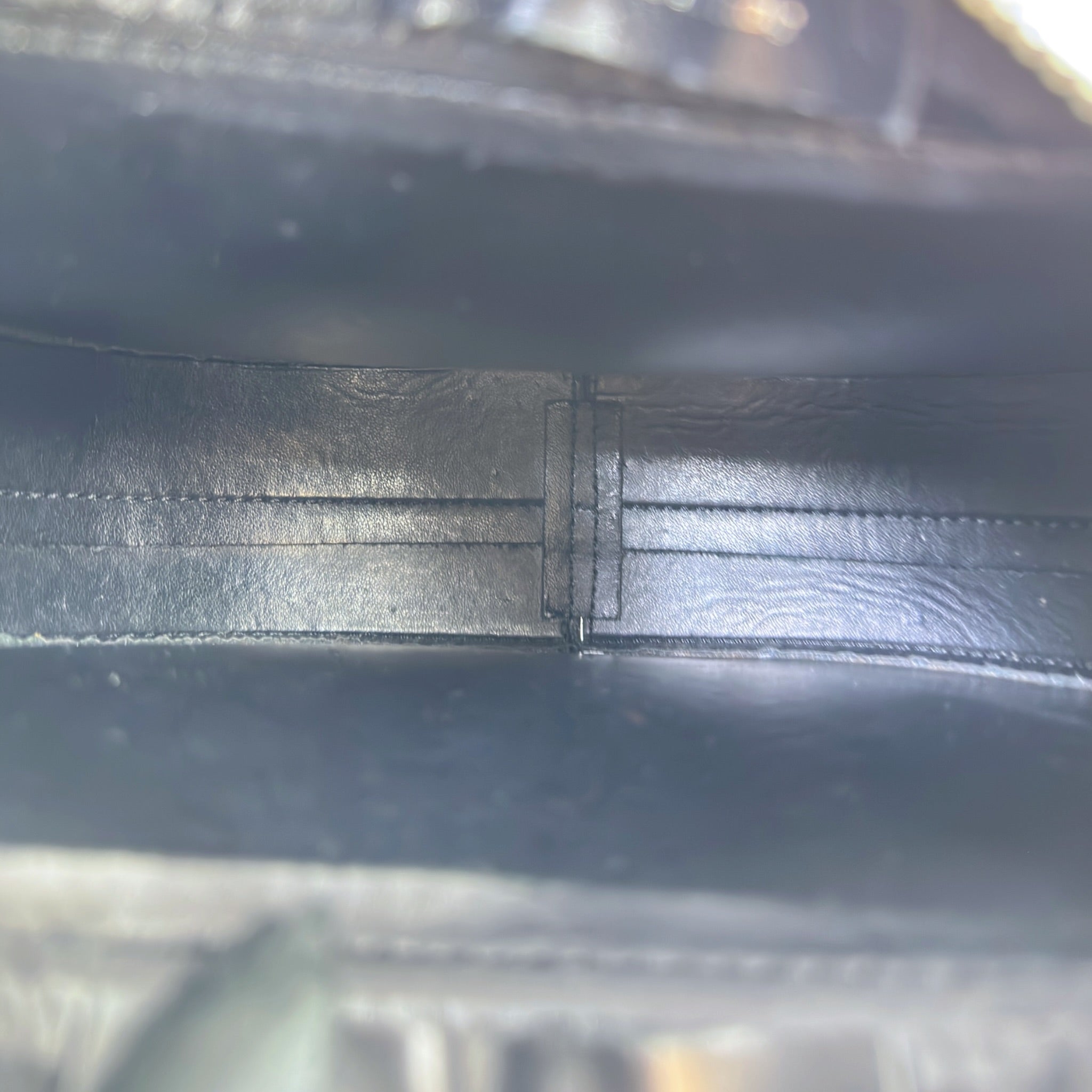Coperni Swipe black leather handbag