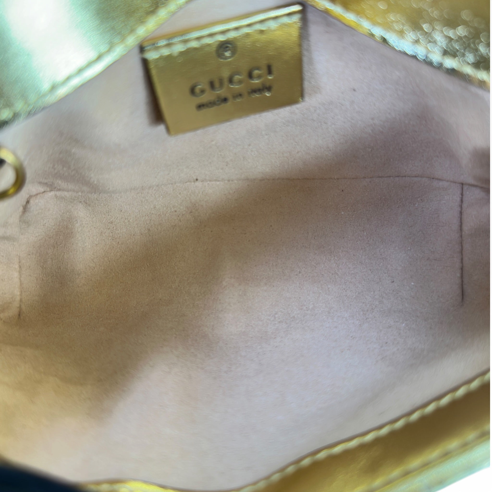 Gucci GG Marmont metallic gold leather mini shoulder bag