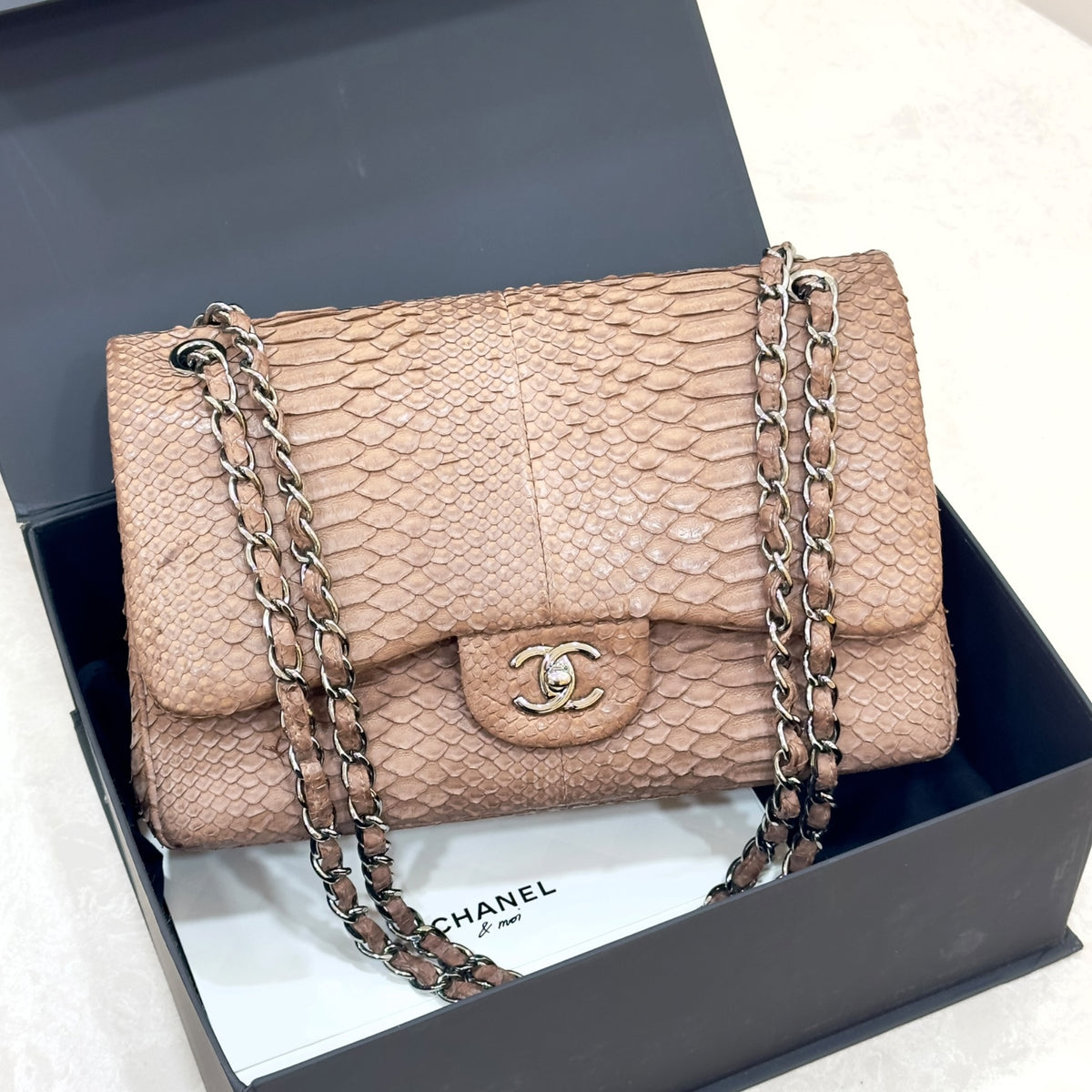 Chanel jumbo python double flap bag