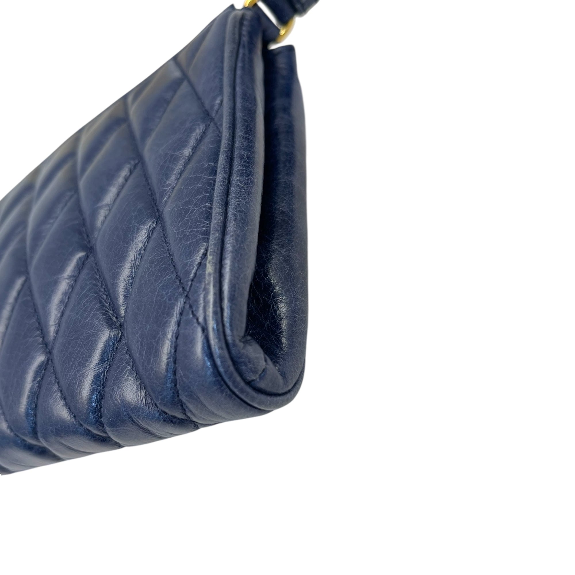 Miu Miu Blue Diamond Quilted Leather Zip Wristlet Clutch