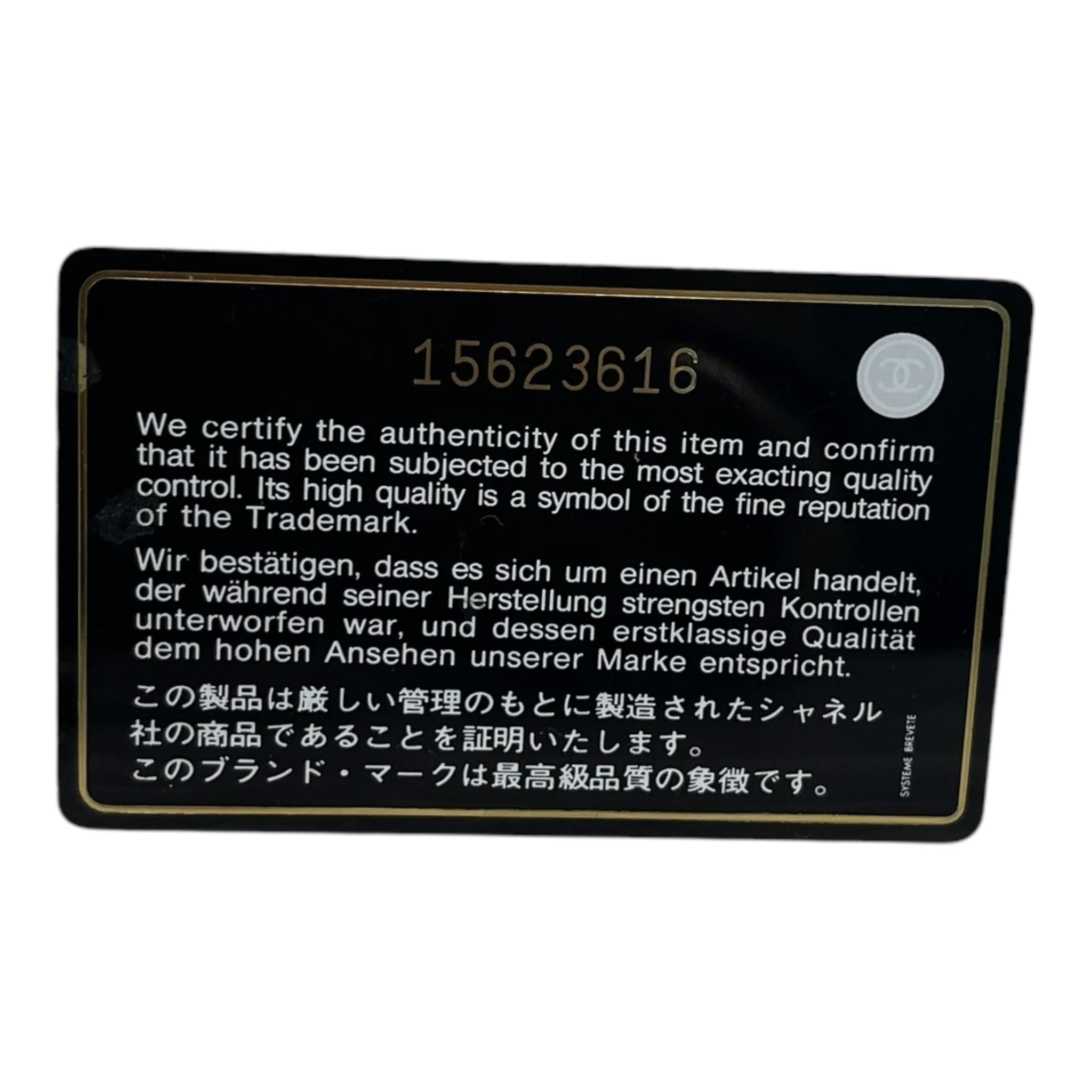 Chanel Classic Mini Flap Bag in Black Pebbled Leather