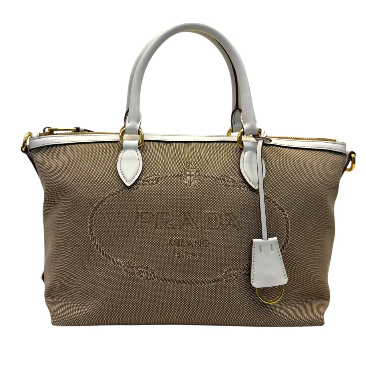 Buy Prada Beige Leather Logo Embossed Zip Tote Online