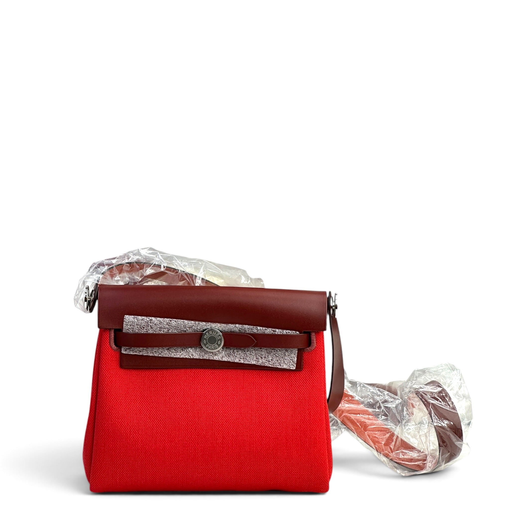  Hermès Retourne 20 Rouge Herbag Military Canvas and Vache Hunter Leather with a Palladium-Plated (2025)