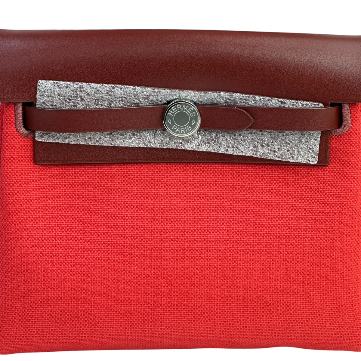 Hermès Retourne 20 Rouge Herbag Military Canvas and Vache Hunter Leather with a Palladium-Plated (2025)