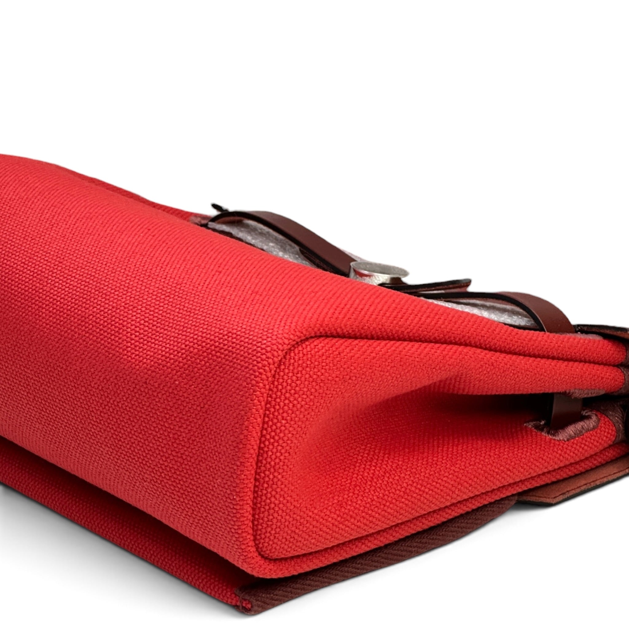 Hermès Retourne 20 Rouge Herbag Military Canvas and Vache Hunter Leather with a Palladium-Plated (2025)