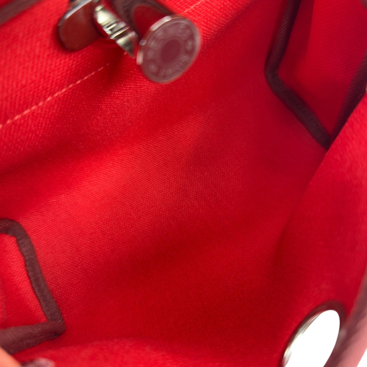 Hermès Retourne 20 Rouge Herbag Military Canvas and Vache Hunter Leather with a Palladium-Plated (2025)