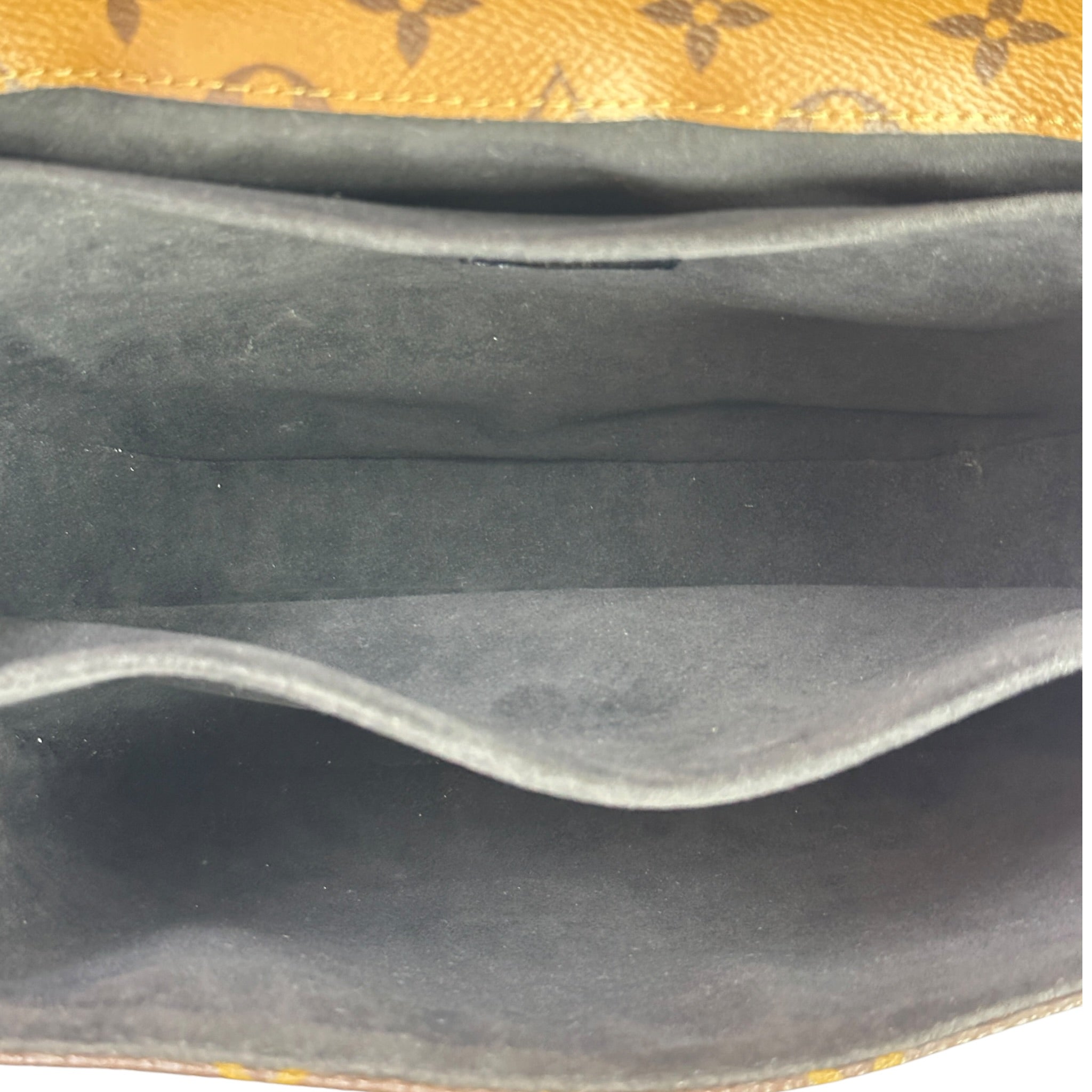 Louis Vuitton Pochette Métis Reverse Monogram canvas