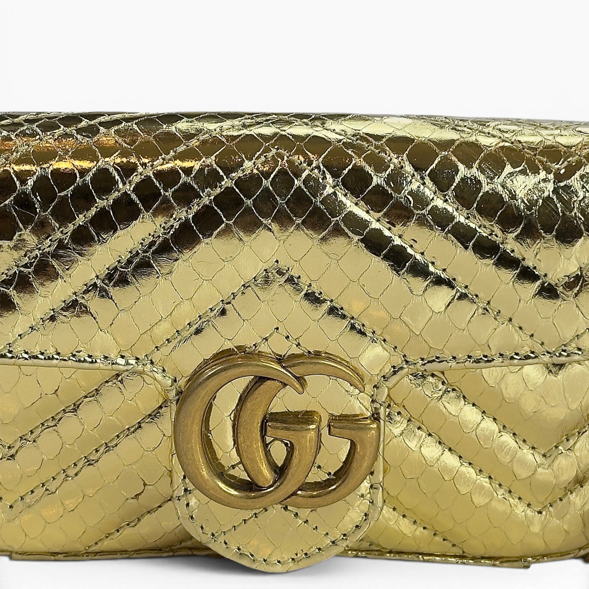 Gucci GG Marmont metallic gold leather mini shoulder bag