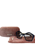 Miu Miu sunglasses Pentagon black/gold grey gradient lenses
