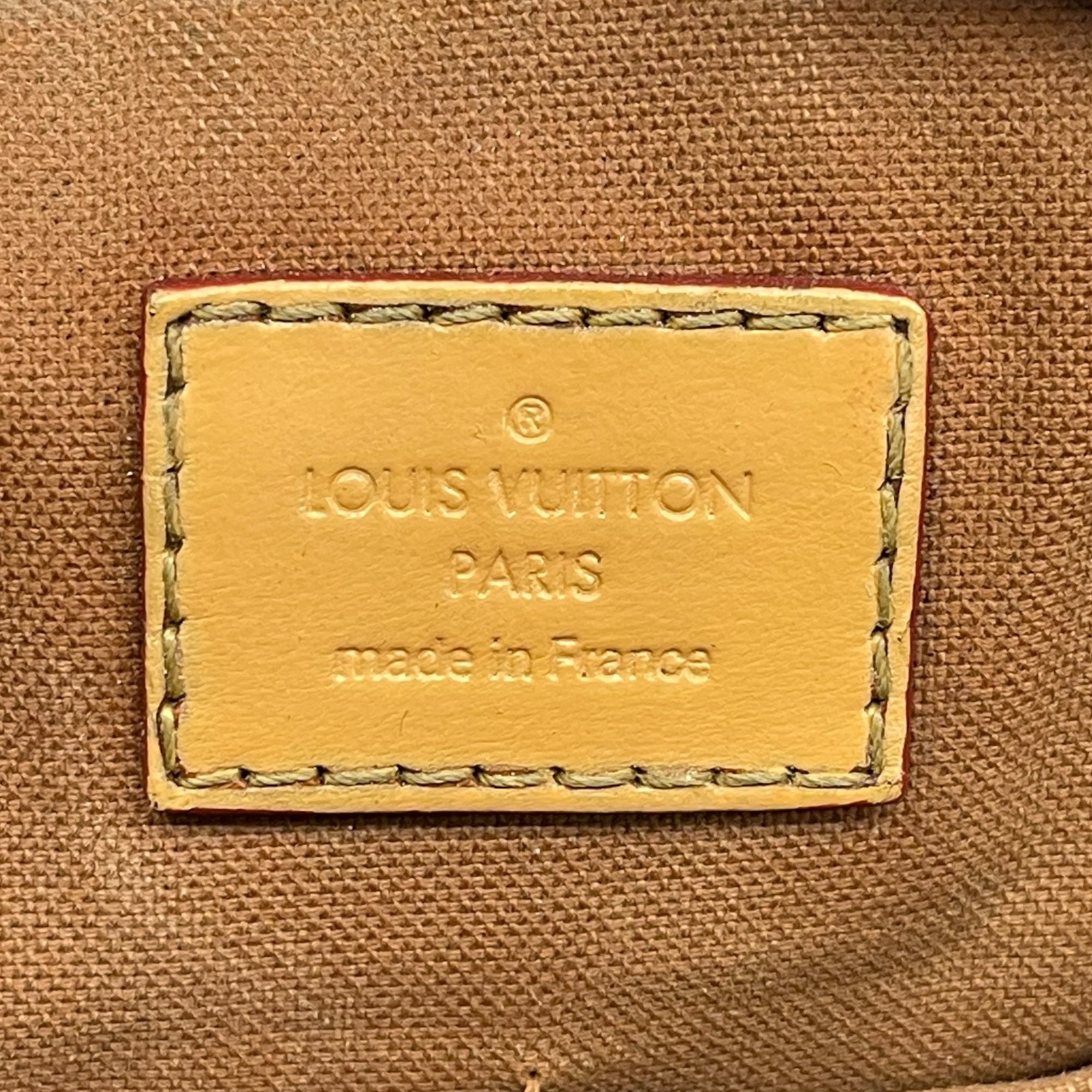 Louis Vuitton Tivoli PM Monogram Handbag