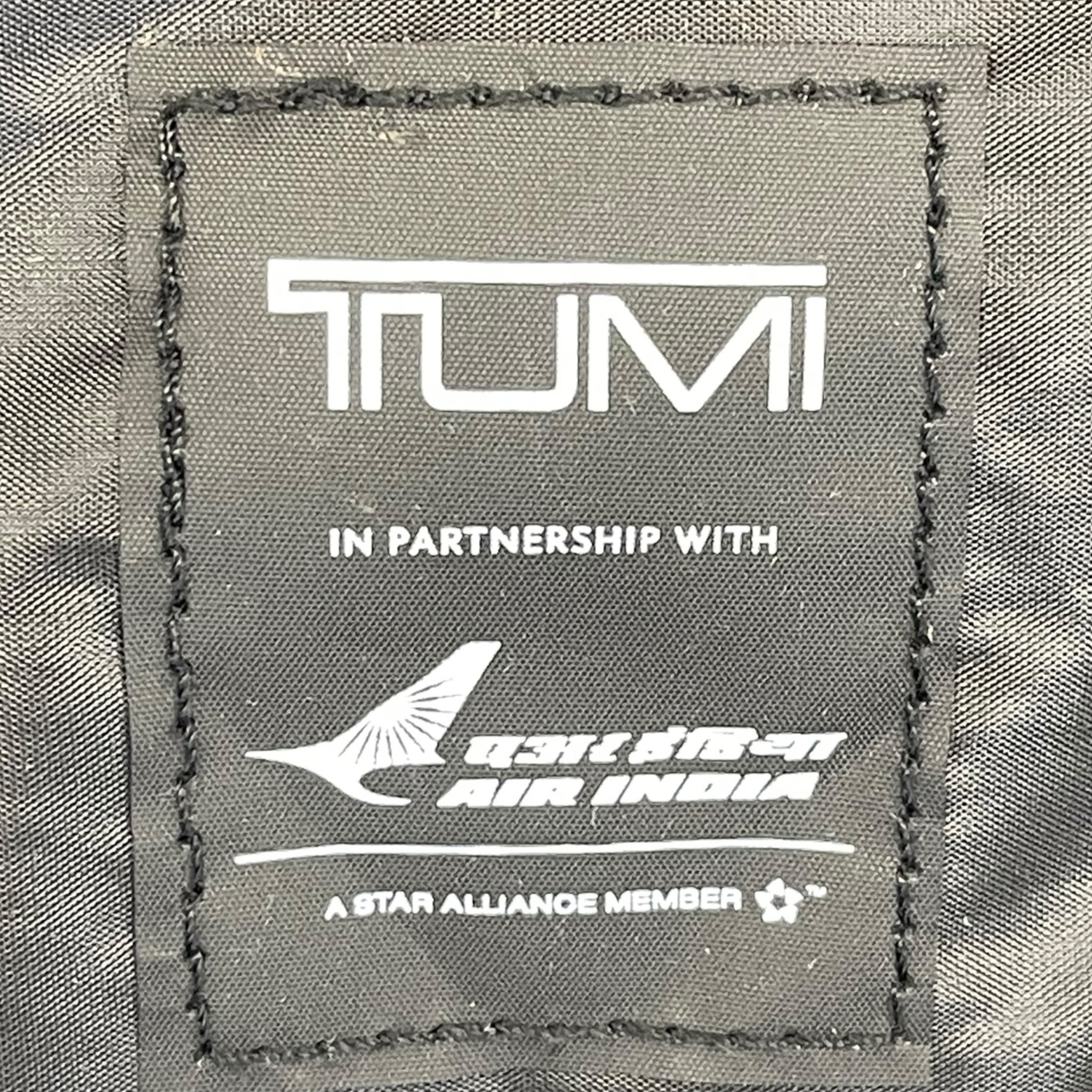 Tumi Travel Case black Hard Shell